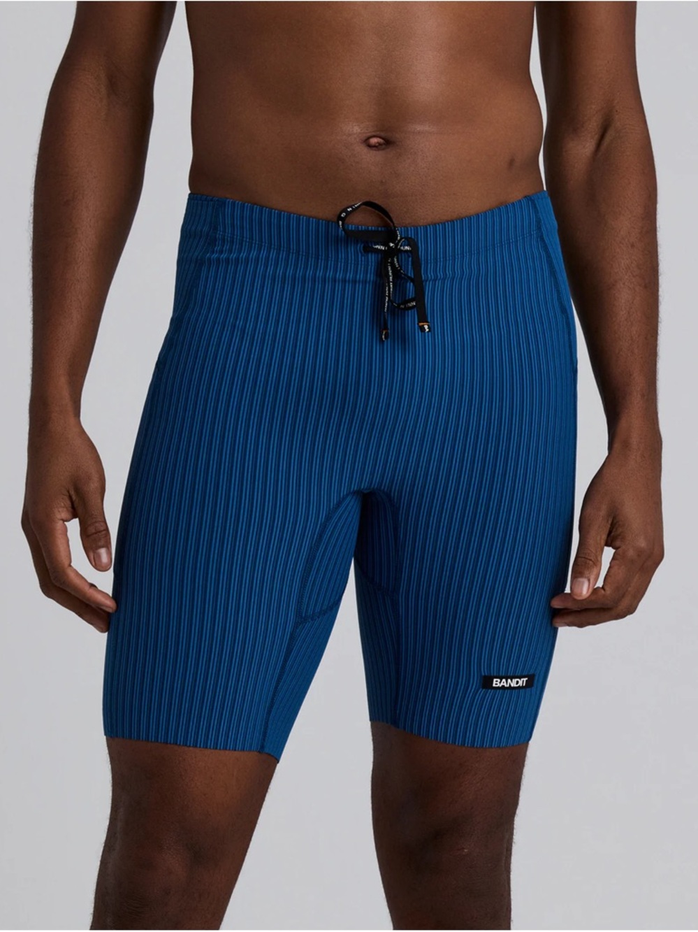 Bandit Running STRIPED CADENCE™ 7 POCKET LINED HALF TIGHTS - INK BLUE / AEGEAN